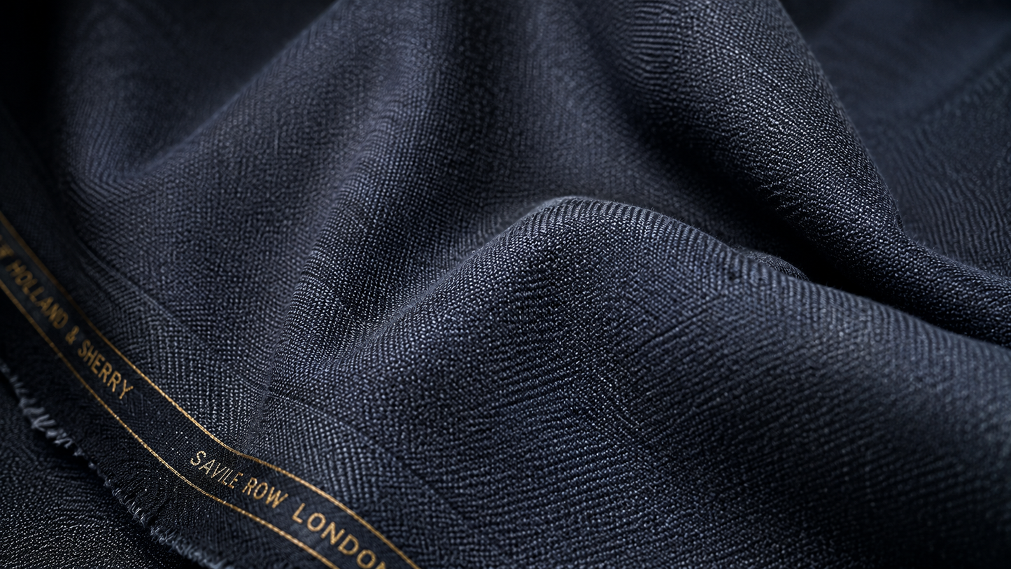 A english wool fabric macro for the Vestium NY journal article ‘Twill vs Herringbone: The Two Weaves That Belong in Every Wardrobe’.