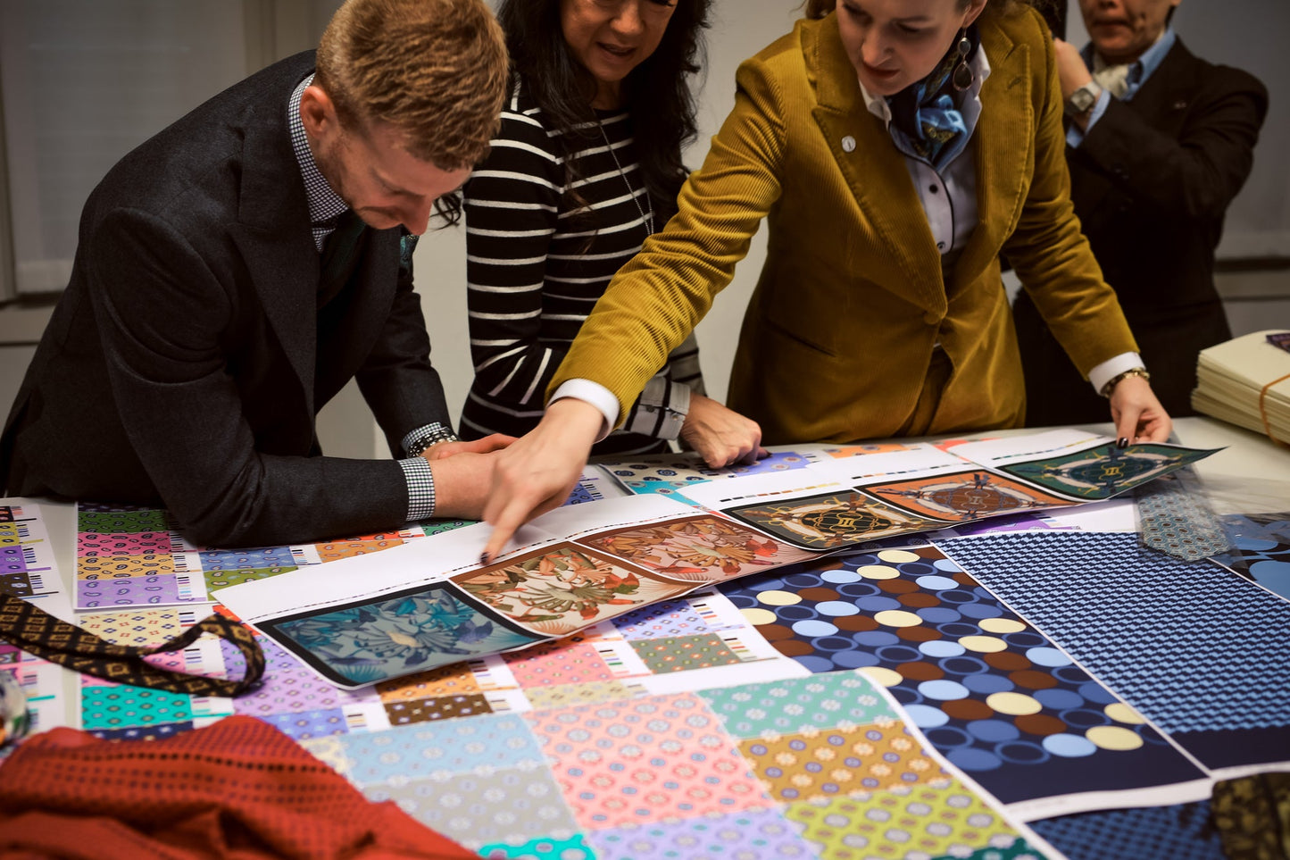 “Custom suit fitting with tailor measuring client during bespoke tailoring process