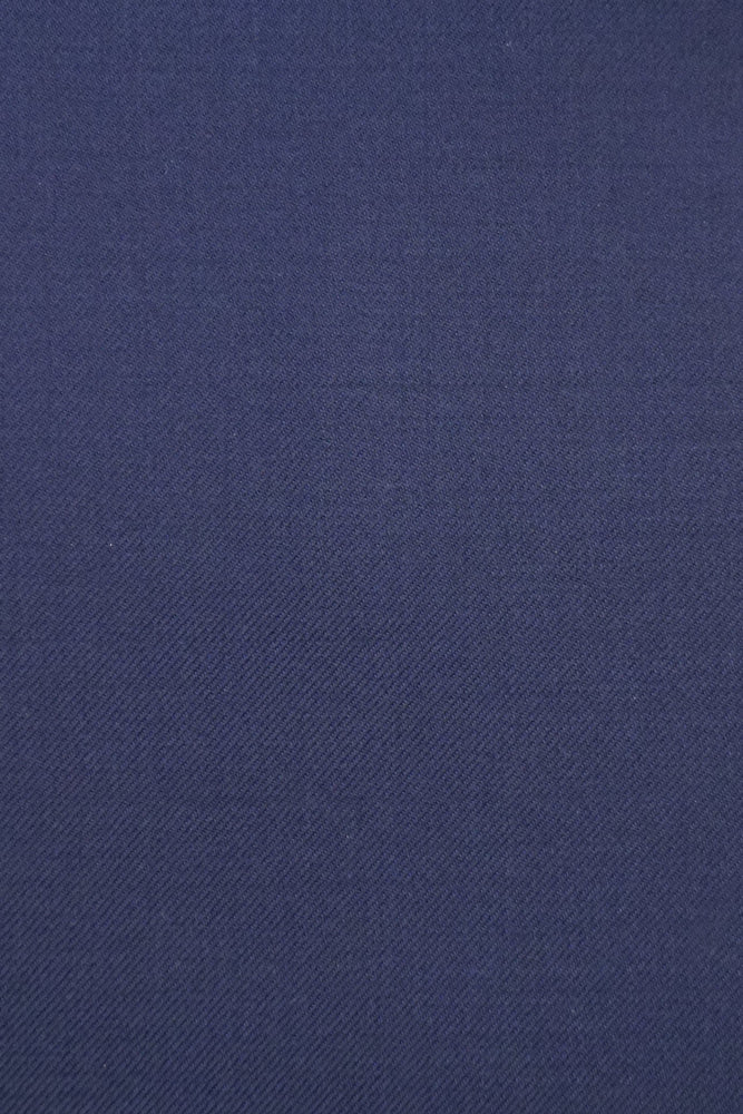 
                  
                    Luxury navy blue wool suit fabric swatch made in Italy
                  
                