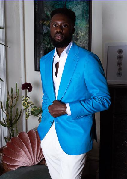 
                  
                    Young Man Wearing Single Breasted Notch Lapel Turquoise Custom Made Suit Jacket
                  
                