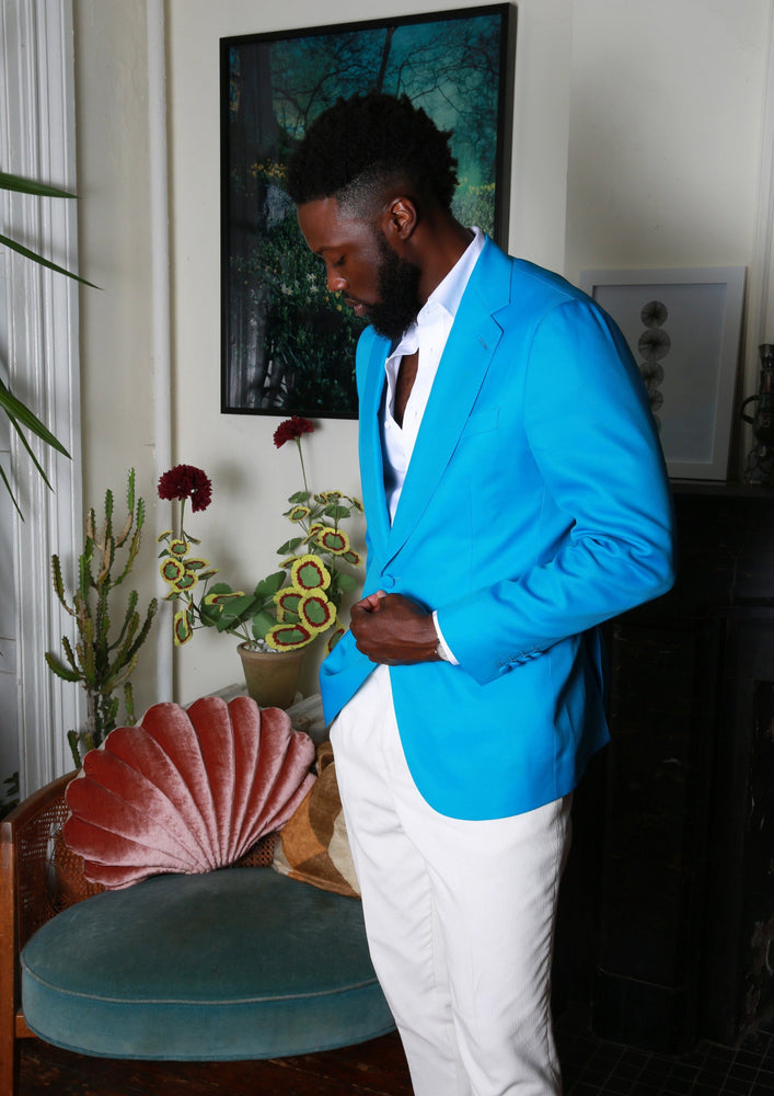 
                  
                    Young Man Wearing Single Breasted Notch Lapel Turquoise Custom Made Suit Jacket
                  
                