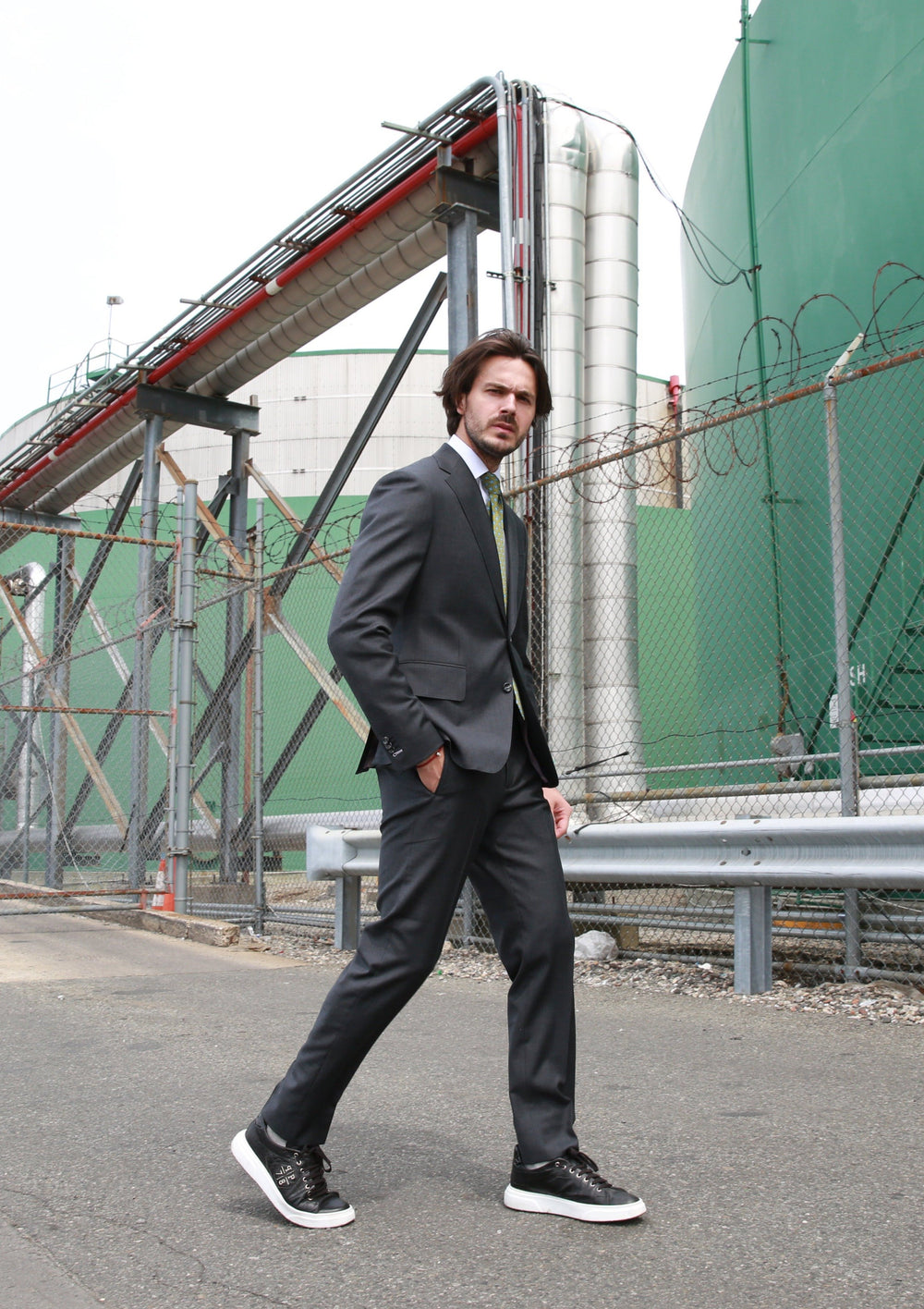 Young man wearing year-round wool single breasted custom business suit